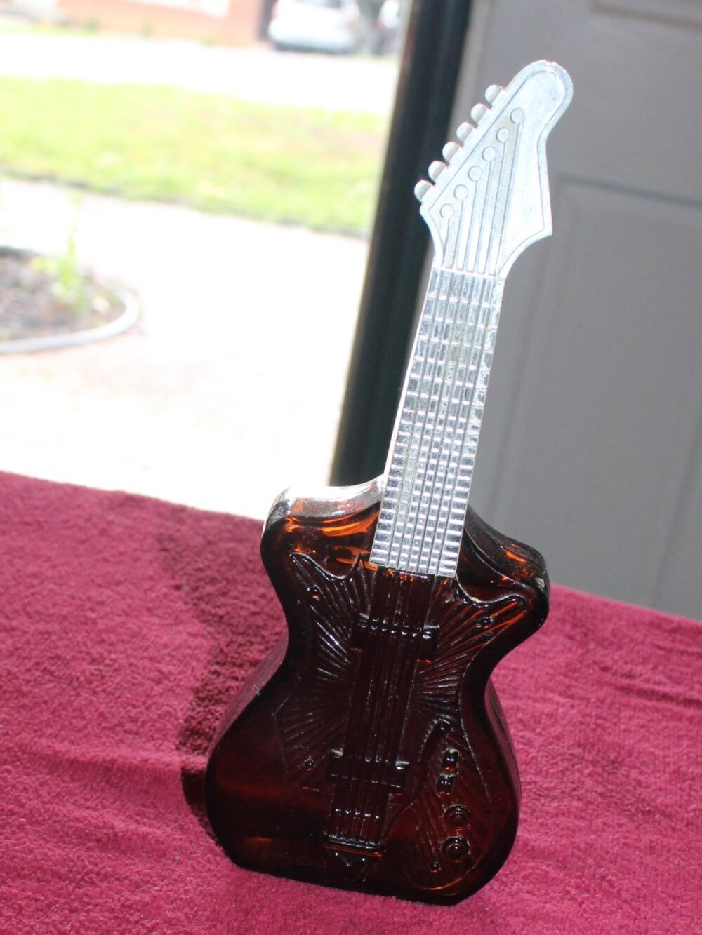 Vintage Avon electric guitar-shaped decanter